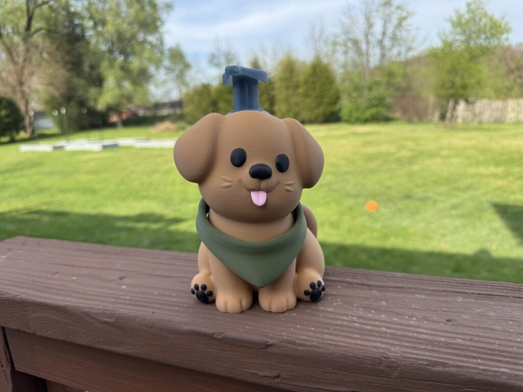 Tan puppy soap holder with green bandana