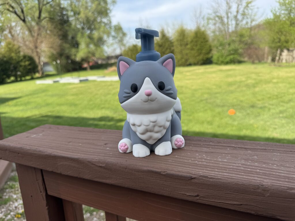 Gray and white kitty soap holder