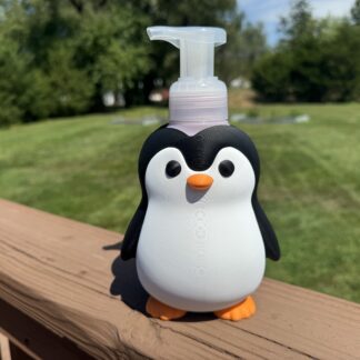 Slide into Cleanliness: The Penguin Foaming Soap Holder!
